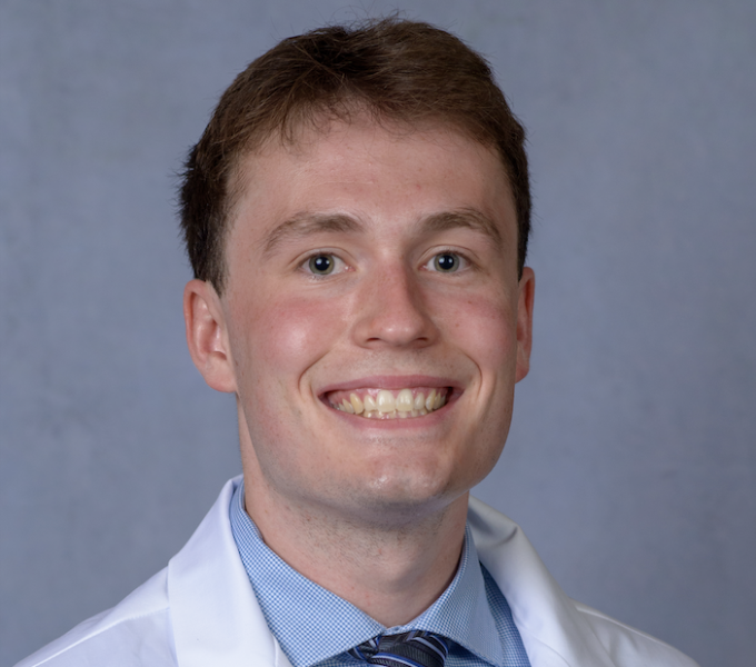 Micah Foster White Coat Photo